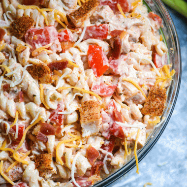 Southwestern chicken pasta salad served in a large glass mixing bowl