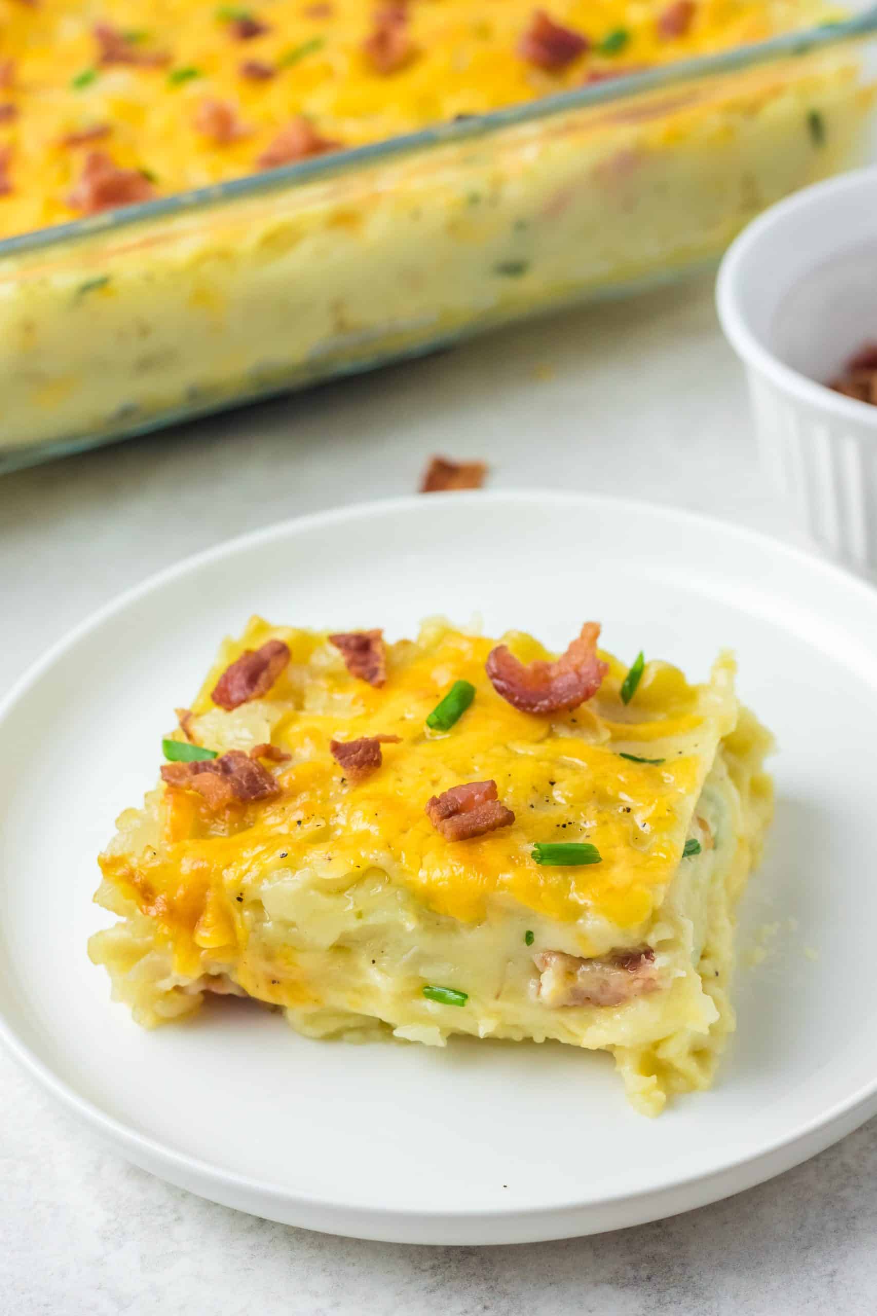 a slice of pierogi lasagna on a small white plate